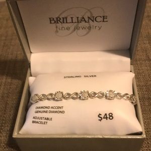 Sterling Silver Bracelet with claw claps and genuine diamonds.